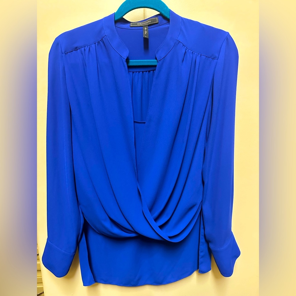 BCBG like new Cobalt Blue long sleeve blouse. Longer in the back